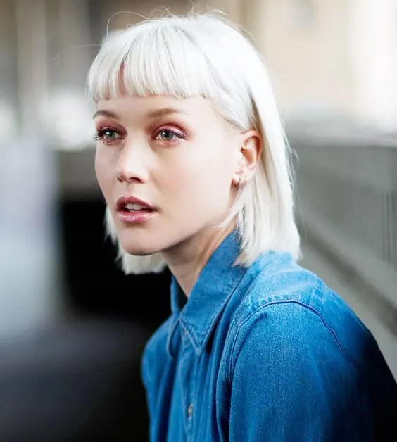 Portrait with platinum blonde bob and denim, photographic, editorial, cool
