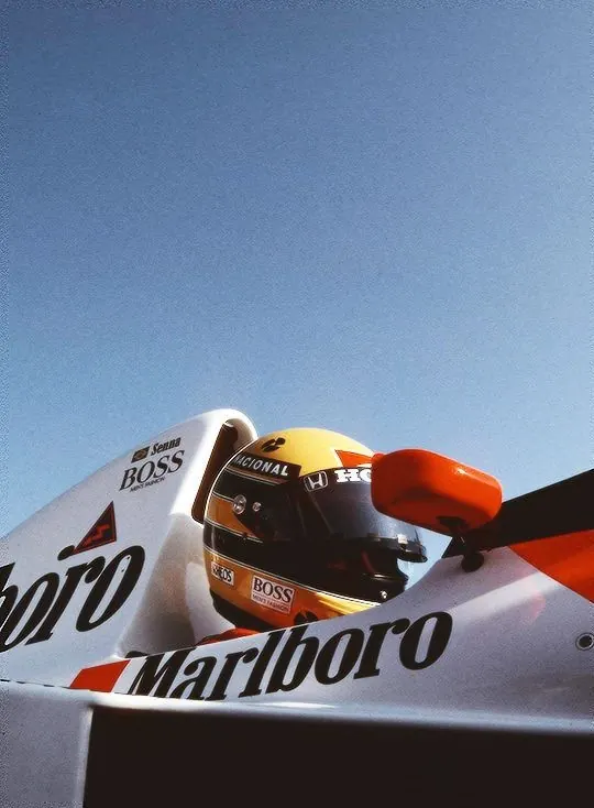 Marlboro racing car helmet and cockpit, photographic, editorial, cool