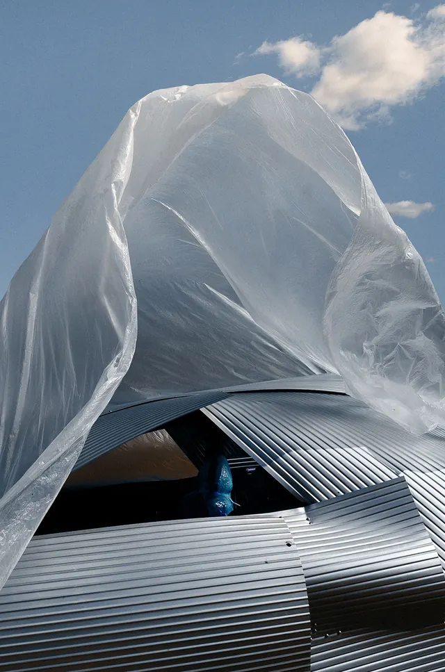 Translucent fabric installation with sky backdrop, minimal, photographic, light