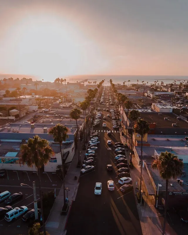 Golden hour suburban street view, photographic, editorial, warm