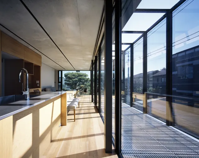 Modern kitchen and living space with glazed walls, minimal, photographic, light