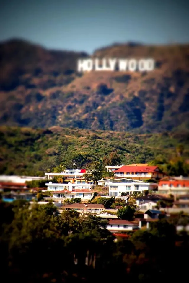 Hollywood sign with hillside villas, photographic, warm, warm