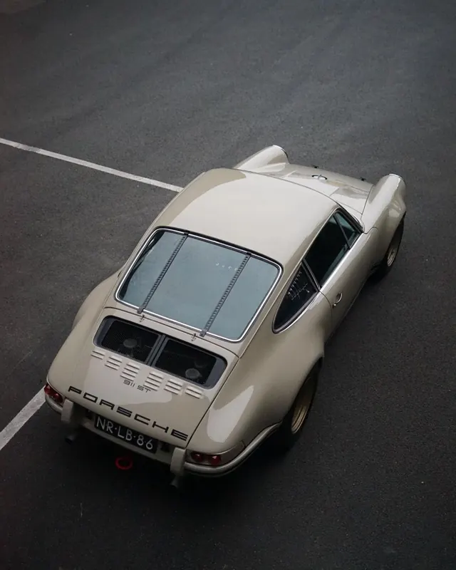 Cream Porsche 911 overhead shot, photographic, light
