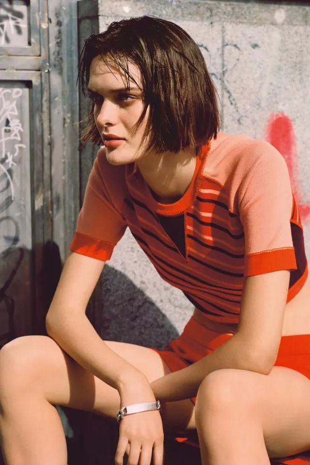 Editorial fashion portrait with warm tones, photographic, editorial, warm