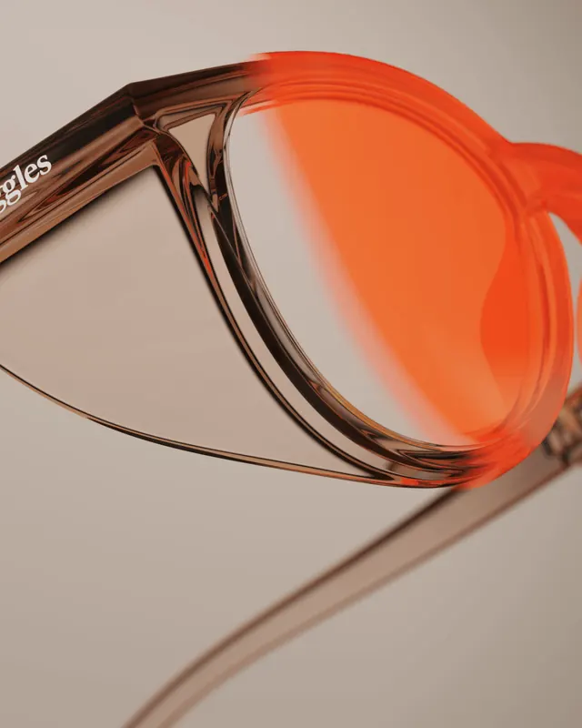 Oversized transparent eyeglasses close-up, photographic, minimal, warm