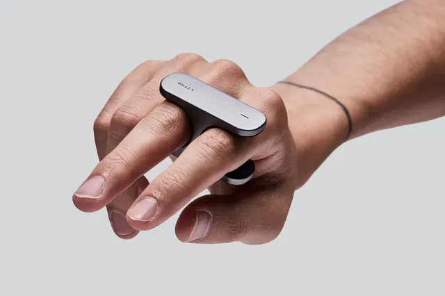 Minimalist wearable device hand shot, photographic, minimal, warm