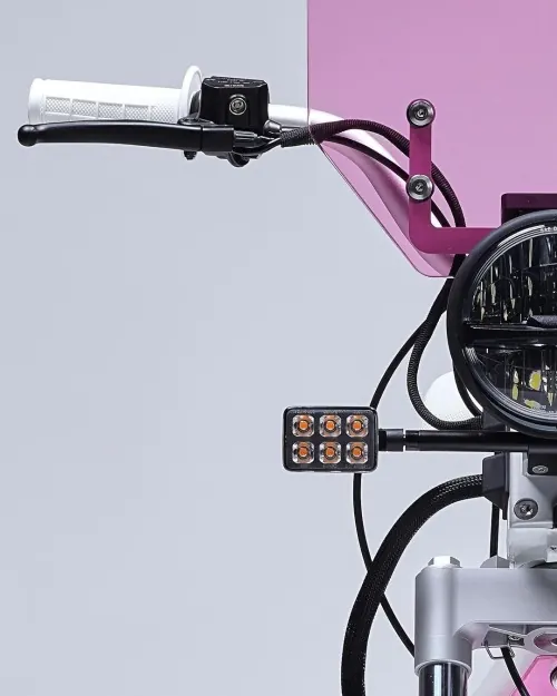 Product detail shot of professional motorcycle light assembly, photographic, technical, light