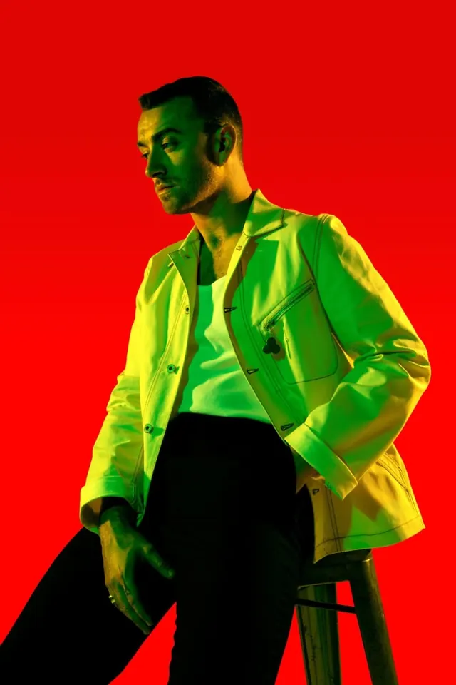 High-contrast figure in neon jacket against red background, dark-mode, high-contrast, vibrant