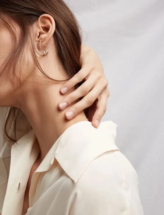 Minimalist ear studs and accessories, minimal, photographic, warm