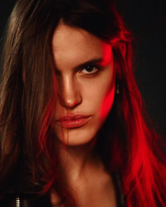 Portrait with red gel lighting, photographic, dark-mode, dark