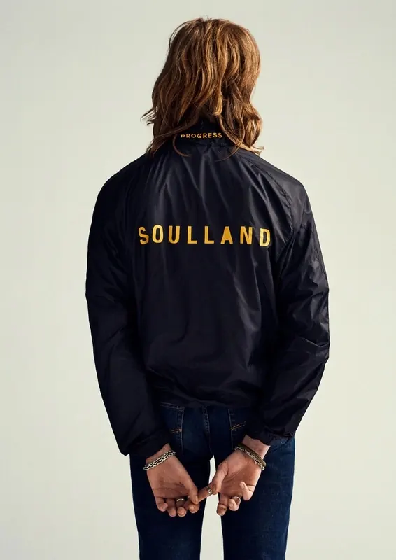 Soulland windbreaker back typography, minimal, photographic, dark