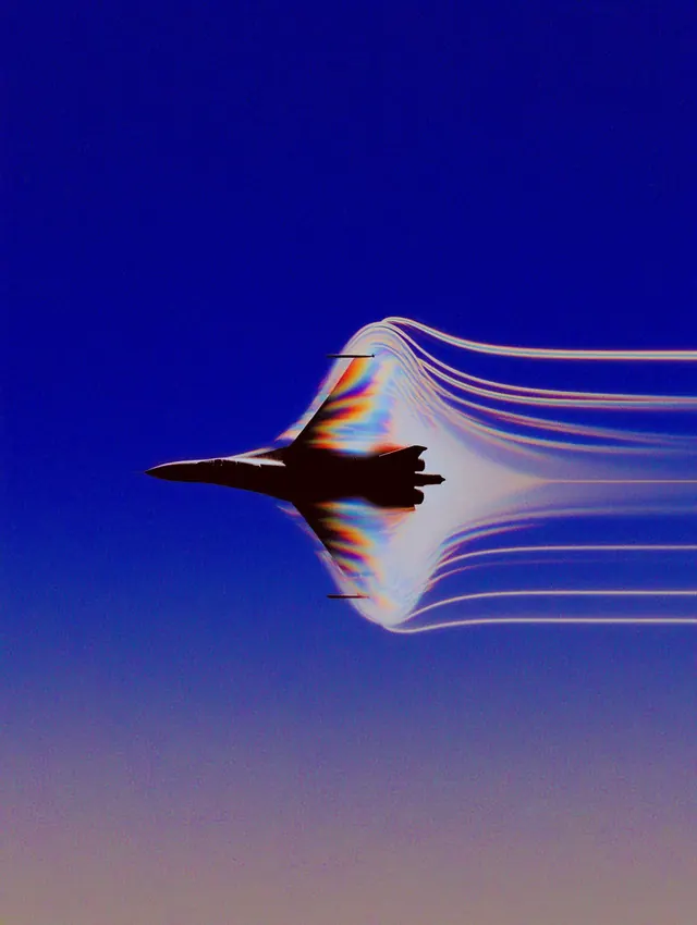 Fighter jet with rainbow shockwave trails, abstract, photographic, cool