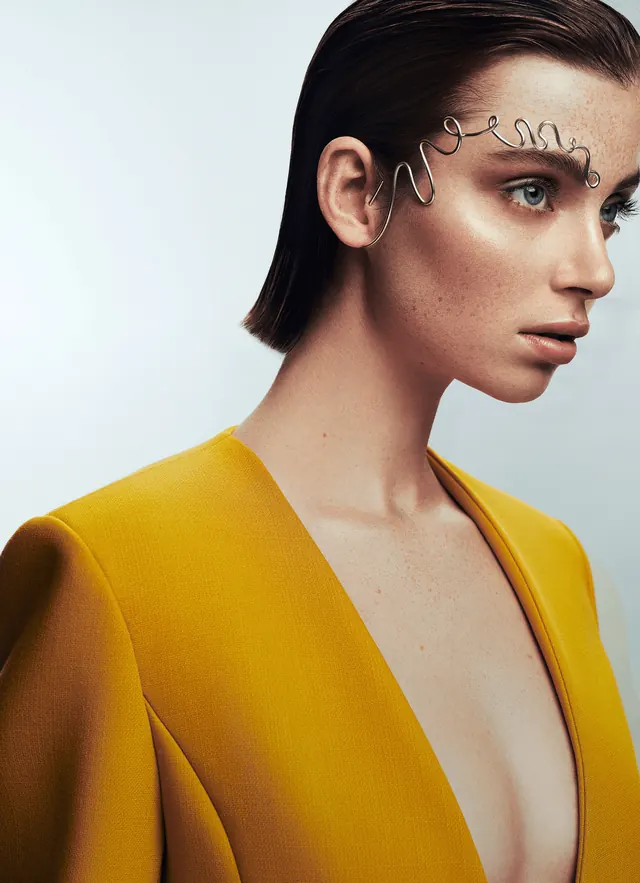 Mustard blazer with wire face jewelry, editorial, photographic, warm
