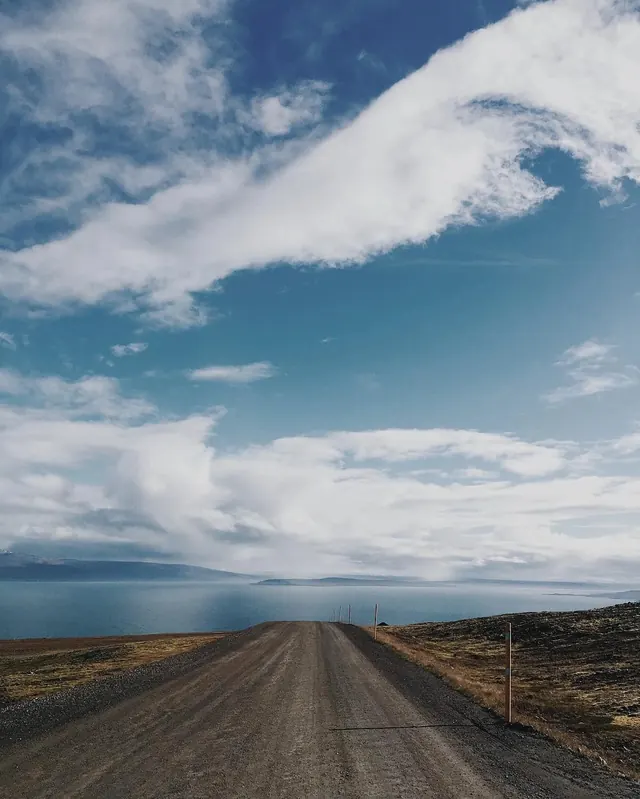 Gravel road to lake landscape, photographic, minimal, cool