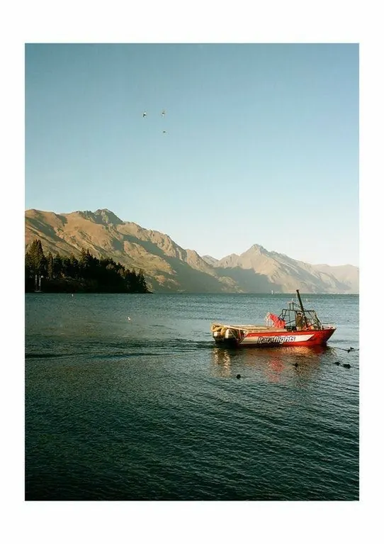 Paraflights boat on mountain lake, photographic, organic, cool
