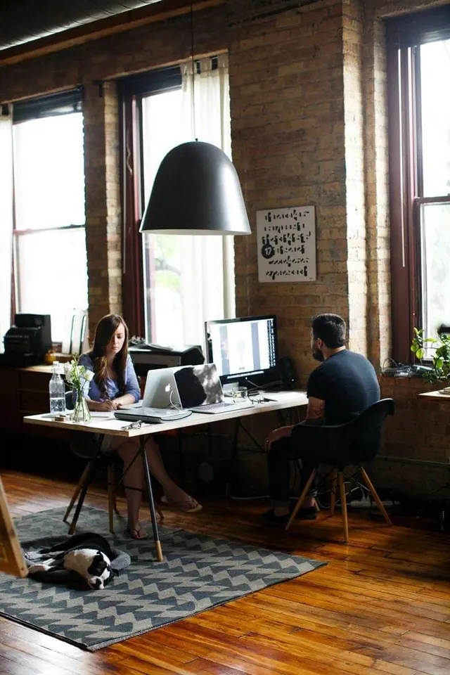 Industrial loft office workspace, photographic, industrial, warm