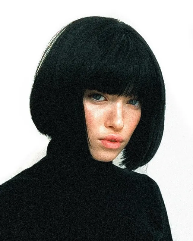 High-contrast bob portrait, minimal, editorial, light