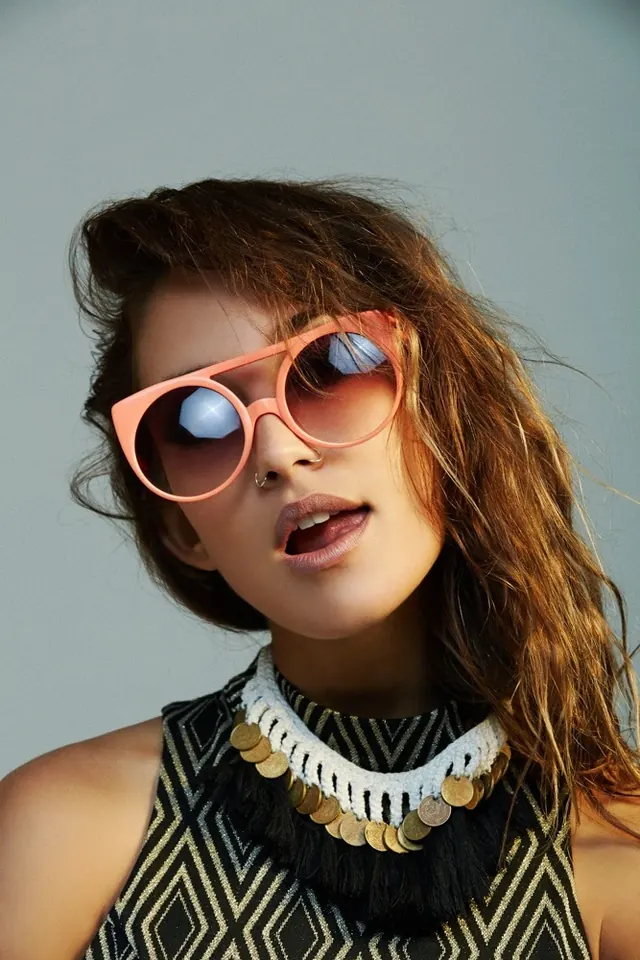 Peach sunglasses bohemian portrait, photographic, playful, warm