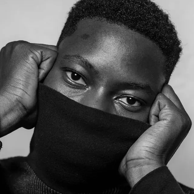 Turtleneck portrait hands on cheeks, photographic, monochrome, monochrome