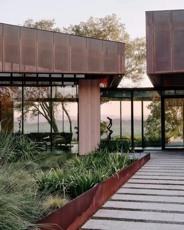Corten steel house at dawn, minimal, organic, muted