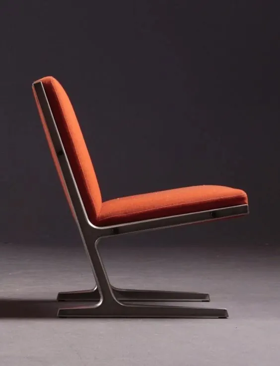 Orange modernist lounge chair profile, minimal, retro, vibrant