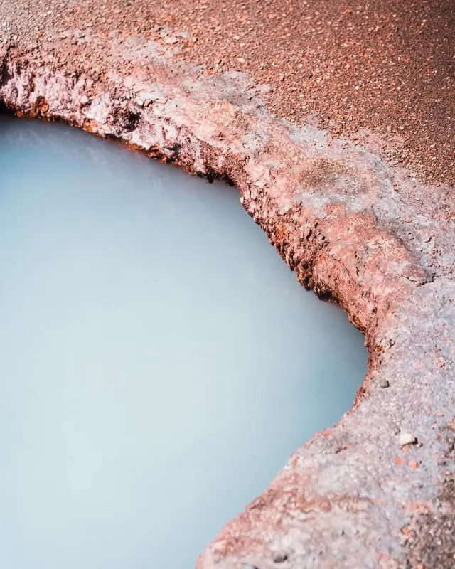Geothermal milky blue pool edge, organic, photographic, cool