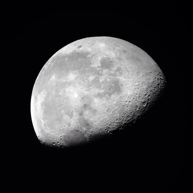 Waxing gibbous moon astrophotograph, photographic, minimal, monochrome