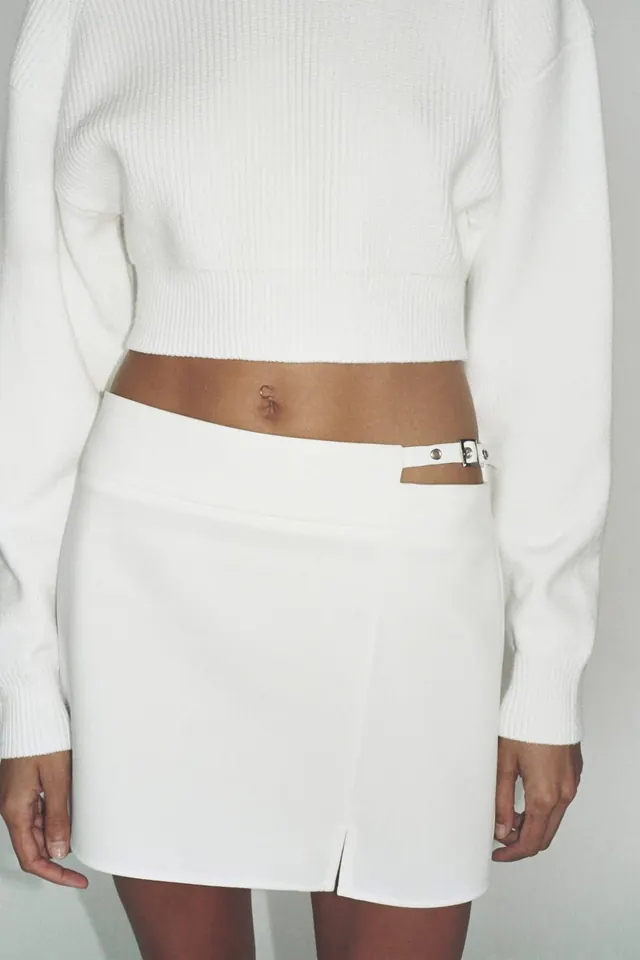 White cropped knit and wrap mini skirt, minimal, photographic, light