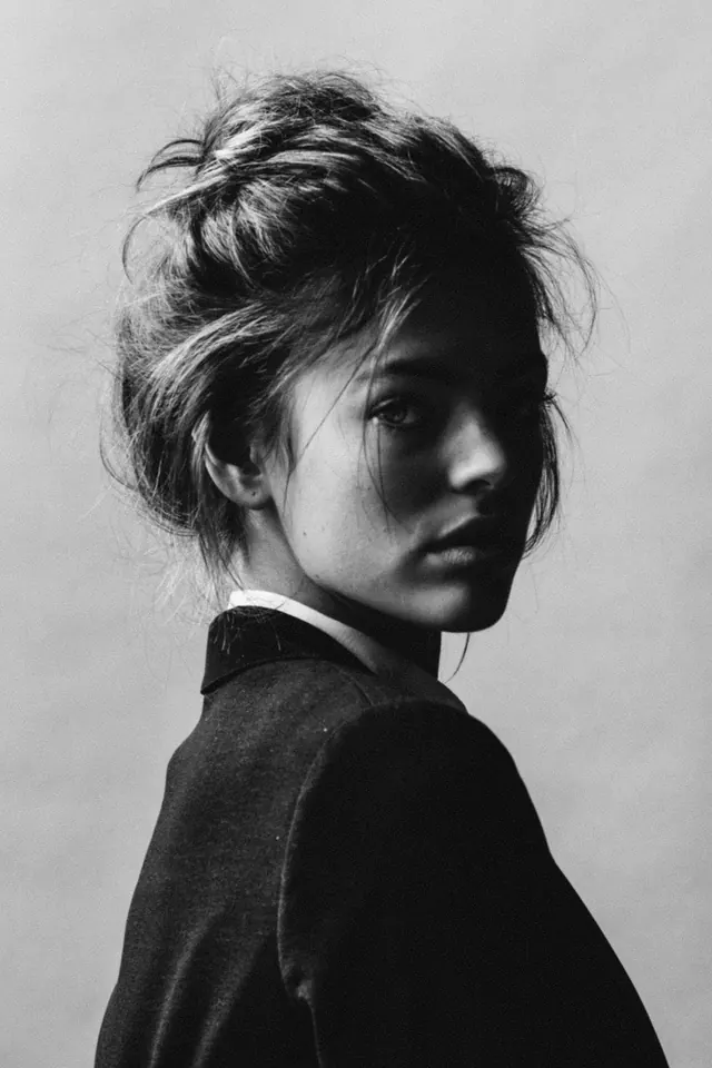 High-contrast black and white artistic portrait, monochrome, high-contrast, monochrome