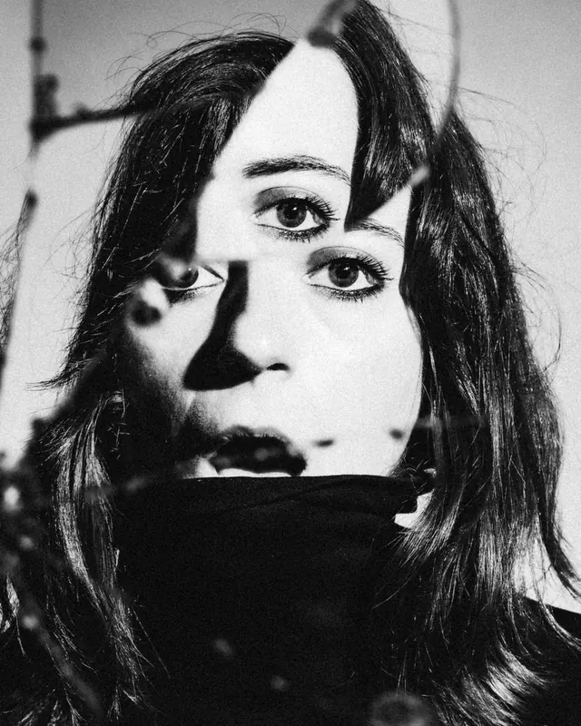High-contrast black and white portrait study, photographic, editorial, monochrome