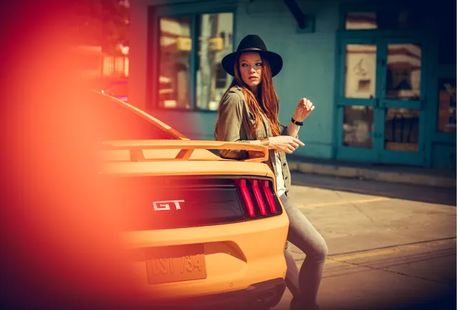 Ford Mustang lifestyle portrait, photographic, gradient-heavy, warm