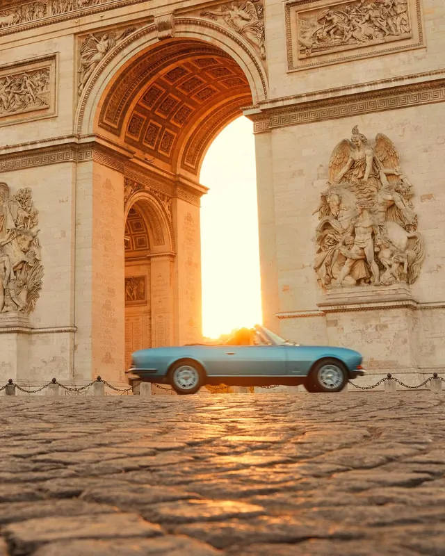 Vintage car and classical architecture, photographic, luxury, warm