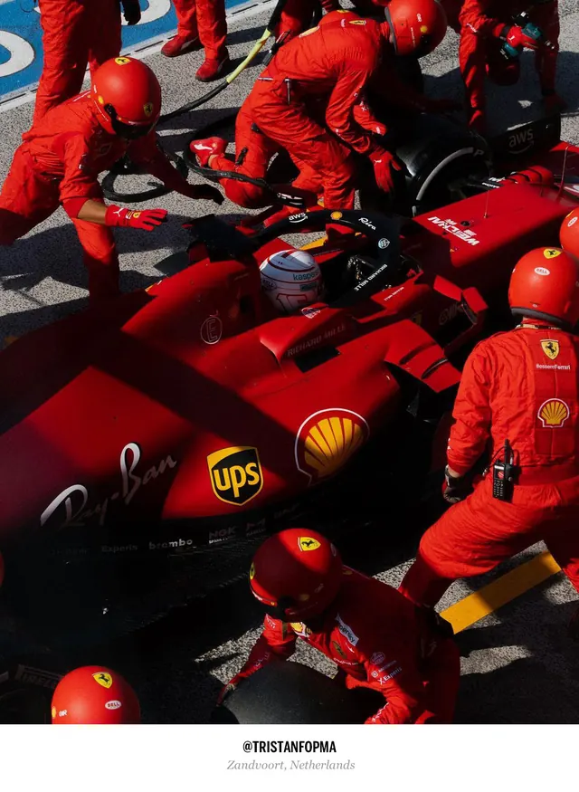 Formula 1 pit crew in action, photographic, bold, vibrant