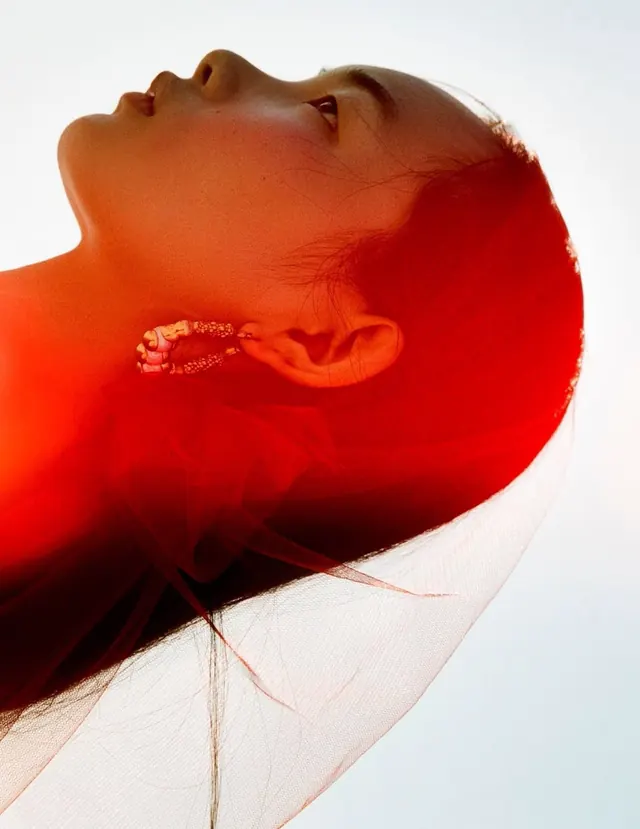 Artistic portrait with warm orange color gel, photographic, artistic, warm