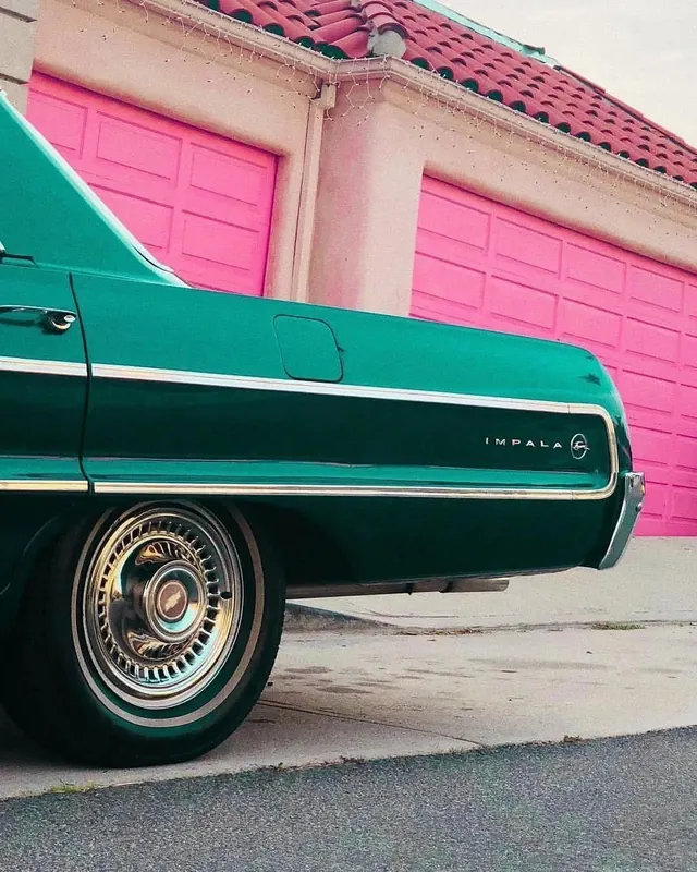 Classic turquoise Chevrolet Impala, photographic, vibrant