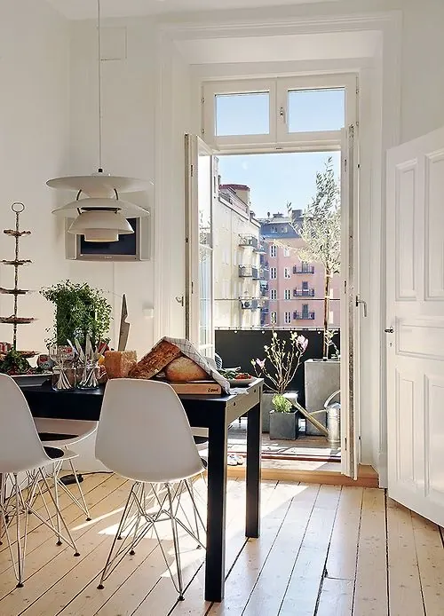 Scandinavian dining nook with city view, minimal, light-mode, light