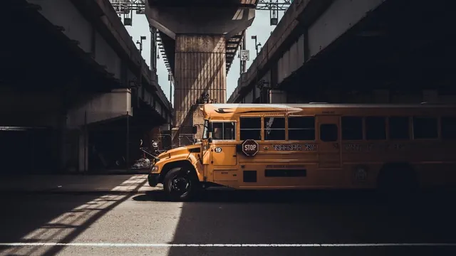 Yellow School Bus in Urban Structure
