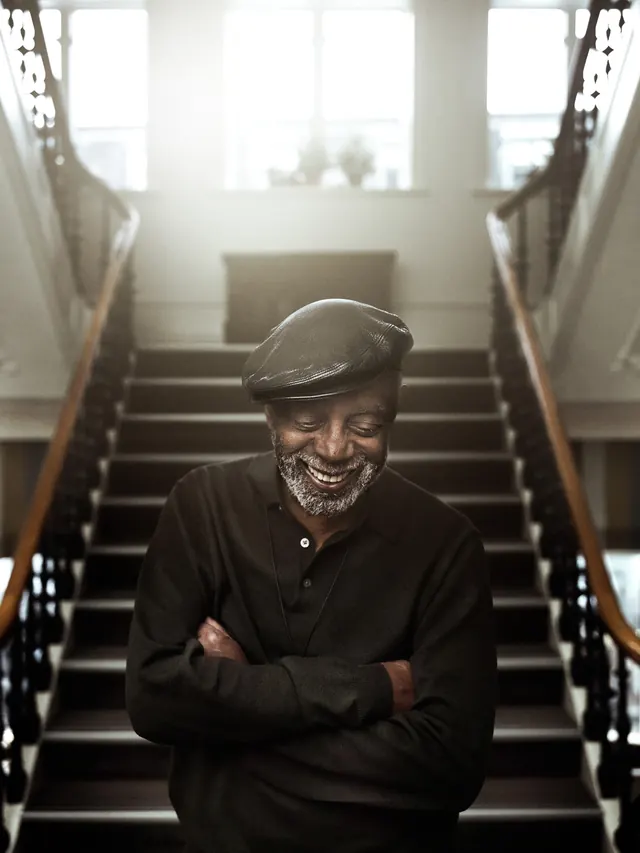 Man in Cap on Stairs