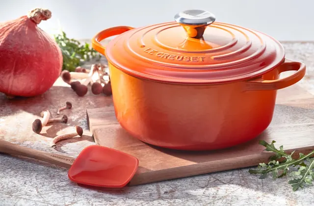 Orange Dutch Oven with Ingredients