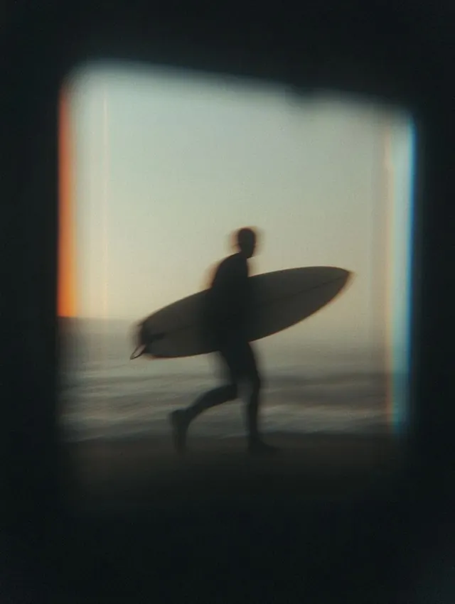 Surfer Silhouette in Mist