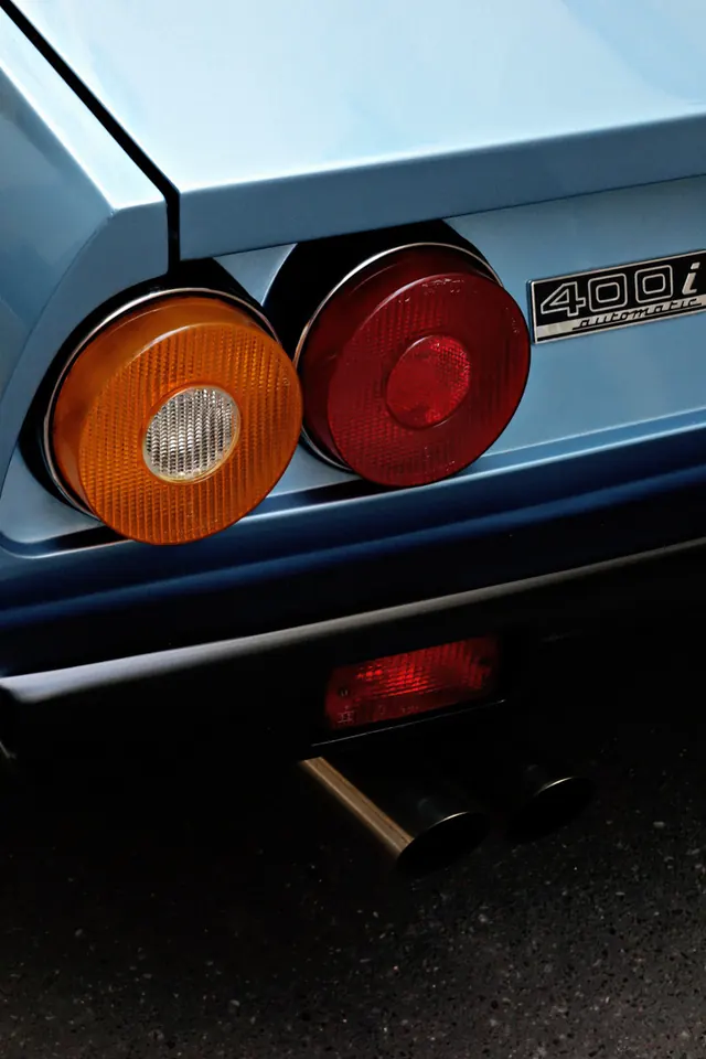 Light blue classic car rear taillights, photographic, light