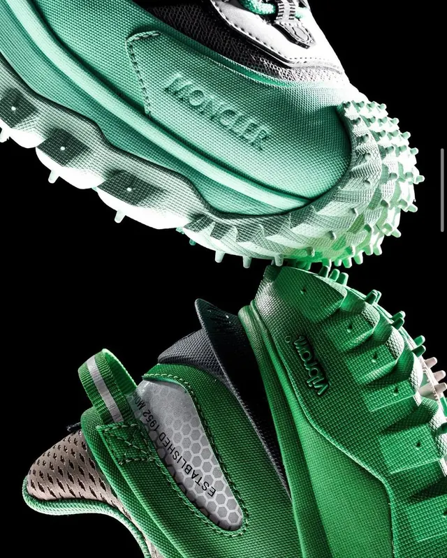 Moncler x Vibram green spiked trail shoes product photo, photographic, minimal, dark