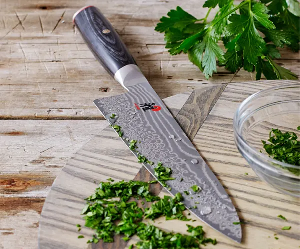 Chef's Knife on Wooden Surface