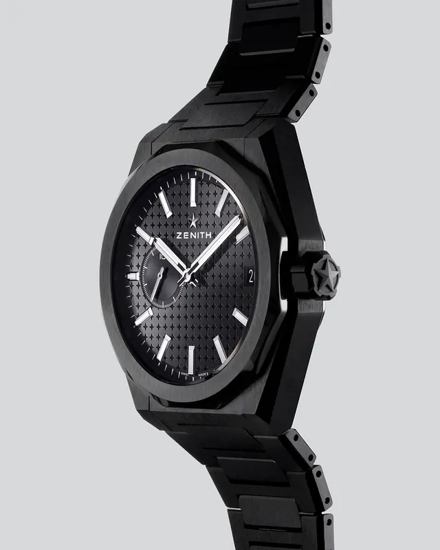 Black luxury wristwatch product shot with textured dial, minimal, luxury, dark