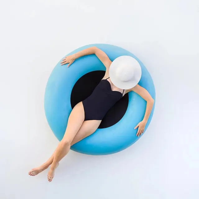 Person in Blue Inner Tube