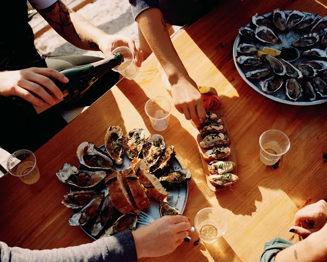 Top-down food spread on wooden table
