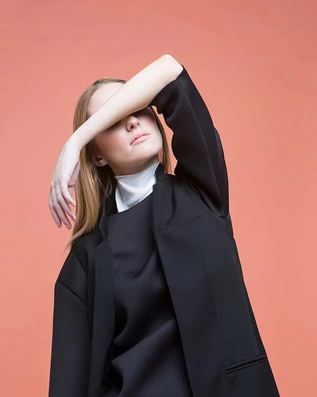 Intimate Portrait with Warm Rose Tones, photographic, editorial, warm