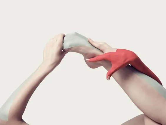 Hands with fabric and color blocking, minimal, photographic, warm