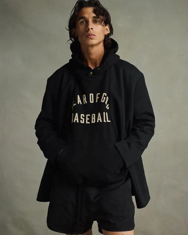 Baseball brand hoodie lifestyle portrait, photographic, minimalist, dark