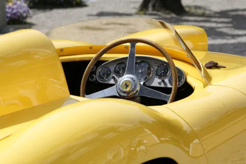 Yellow classic convertible interior detail, photographic, luxury, warm